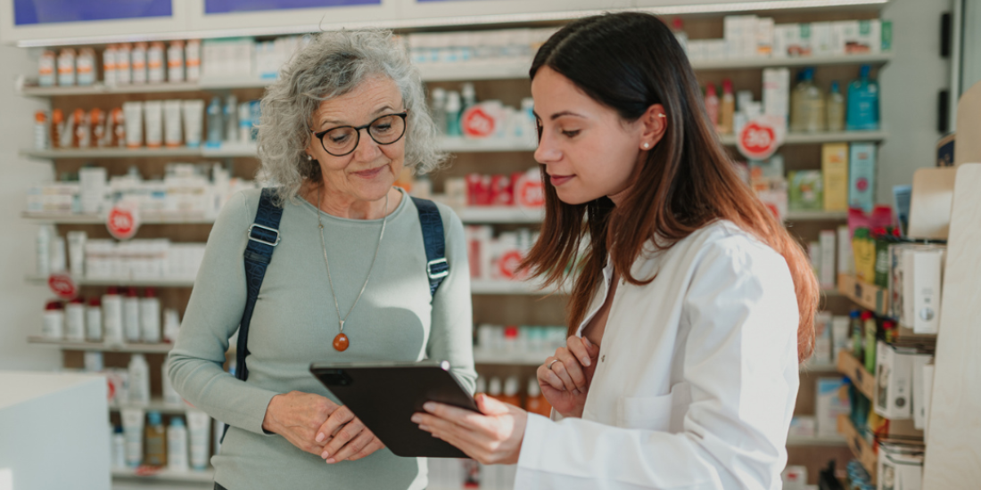 A pharmacist talking to a customer/patient